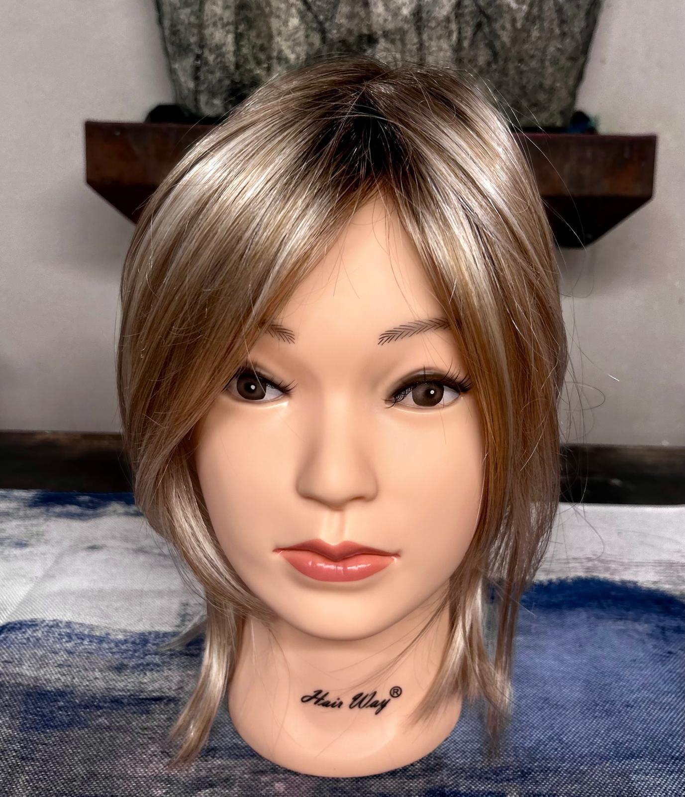 Rooted light blonde hair topper with soft face-framing layers
