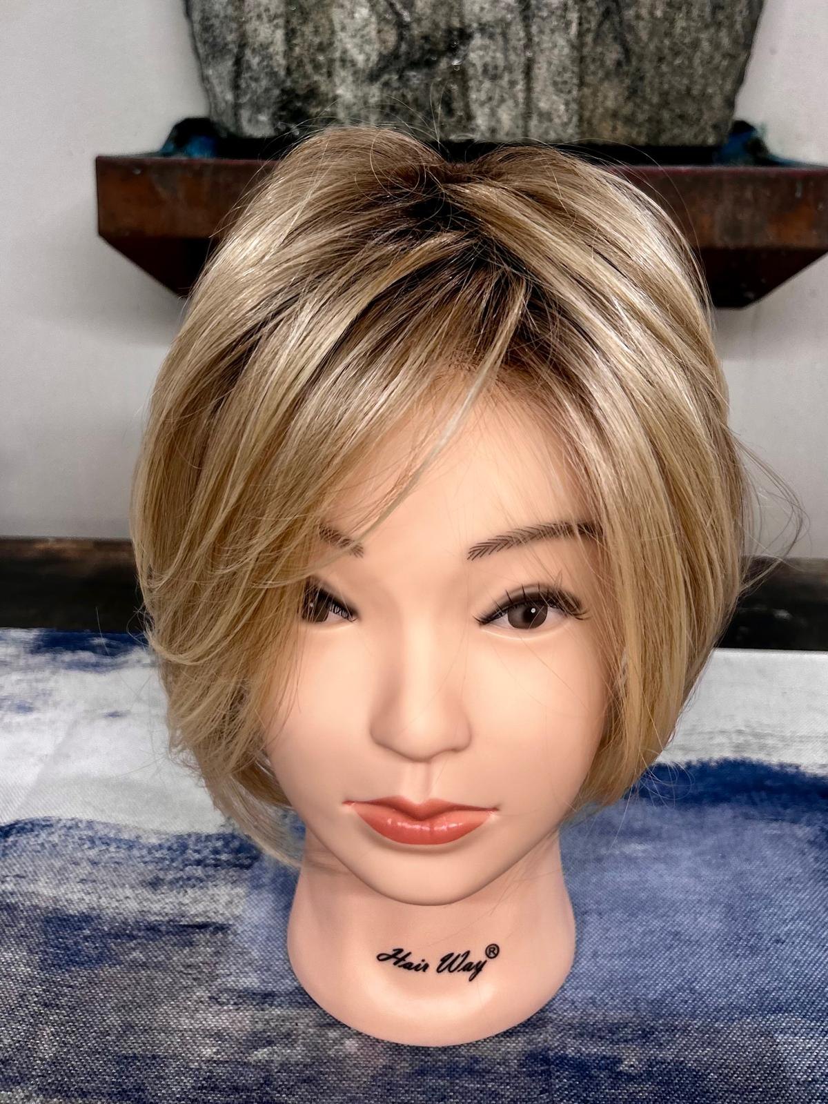 Short blonde highlighted pixie wig with soft side-swept layers