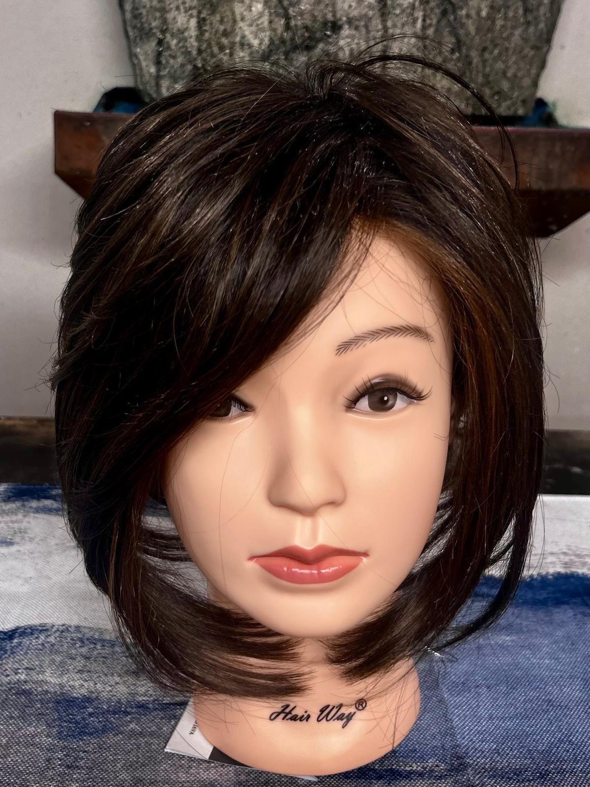 Dark brunette angled bob wig with side-swept fringe