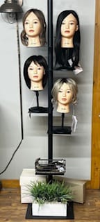 Wig collection and styling display at Media Artistry